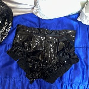 Black faux leather shorts